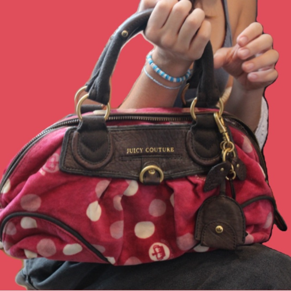 Rare pink polka dot juicy couture purse with charms included